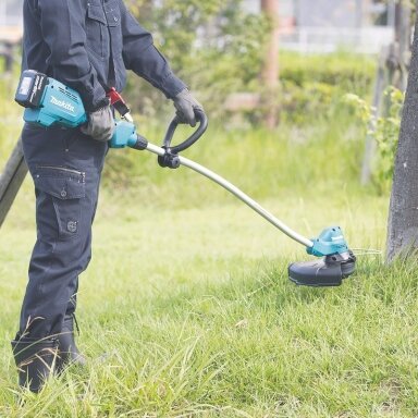 Makita DUR189RT akumuliatorinis trimeris (18V 5Ah akumuliatorius + kroviklis DC18RC) Makita DUR189RT akumuliatorinis trimeris (18V 5Ah akumuliatorius + kroviklis DC18RC)
